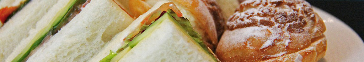 Eating Burger Sandwich at Douglas Drive-In Restaurant restaurant in Whittier, CA.